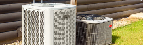 Air conditioner and heat pump outside a Pensacola home